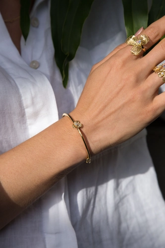 Pulseira Printemps bracelete tubo flor filigrana ouro 18k com gema Tanzanita