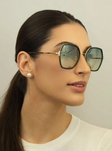 Óculos de Sol Chopard Ice Cube SCHL02V 54300K Metal Dourado e Verde com lentes na cor Verde Degradê
