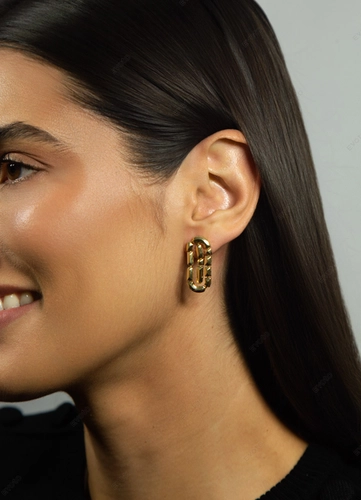 Brinco Colosseo oval ouro 18k módulos simétricos polidos